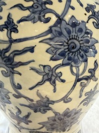 A Chinese blue and white 'Lotus Scroll' vase and cover, Ming