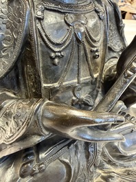A fine Chinese bronze figure of Bodhisattva holding a ruyi, Ming