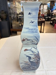 A Chinese blue, white and copper-red 'Birds among Flowering Branches' square gourd vase, 19th C.