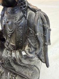 A fine Chinese bronze figure of Bodhisattva holding a ruyi, Ming