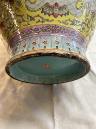 A pair of large Chinese famille rose yellow-ground 'Hu' vases with narrative design, Qianlong mark, Republic