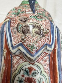 A rare Chinese wucai figure of a dignitary, late Ming/Transitional period