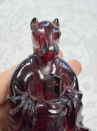 A rare complete set of 12 Chinese cherry amber 'Zodiac' figures on wooden stands, Qianlong mark, Republic