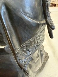 A fine Chinese bronze figure of Bodhisattva holding a ruyi, Ming