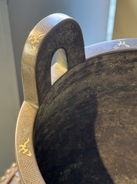 A rare Chinese gold- and silver-inlaid bronze 'Ding' censer with Taotie design on a hongmu stand, Shaosheng 紹聖 and Su Zhe 蘇轍 mark, Song or later