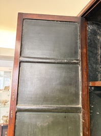 A large Chinese elmwood tapered round-corner cabinet, 'Yuanjiaogui', early Qing, 17/18th C.