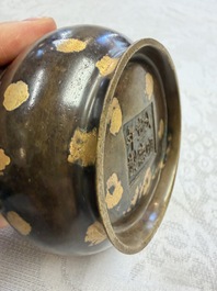 A Chinese gold-splashed bronze censer with two handles, Xuande mark, 18th C.