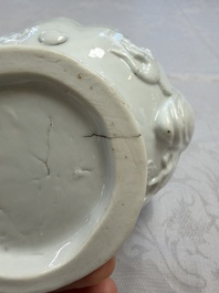 A very large Chinese Dehua blanc de Chine libation cup with a dragon, a qilin, a tiger and a crane, 18th C.