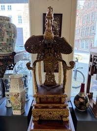 An exceptional Vietnamese gilt-lacquered wood and ivory 'Dragon and Phoenix' throne-shaped altar, 18/19th C.
