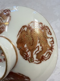 A fine Chinese iron-red gilt-decorated covered teabowl with a stand, Guangxu mark and of the period
