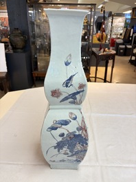 A Chinese blue, white and copper-red 'Birds among Flowering Branches' square gourd vase, 19th C.
