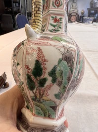 A rare Chinese famille verte puzzle jug with a wooden cover, Kangxi