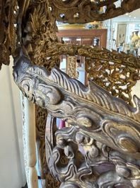 An exceptional Vietnamese gilt-lacquered wood and ivory 'Dragon and Phoenix' throne-shaped altar, 18/19th C.