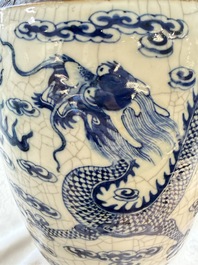 A pair of Chinese blue and white Nanking crackle-glazed 'Dragons' vases, 19th C.