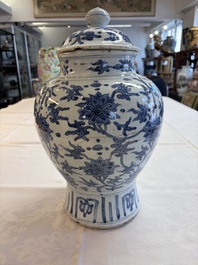 A Chinese blue and white 'Lotus Scroll' vase and cover, Ming