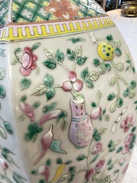 A pair of Chinese famille rose 'Antiquities' vases and covers, 19th C.