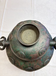 A large Chinese archaistic bronze wine vessel and cover with ram-form handles, Lei 罍, Ming