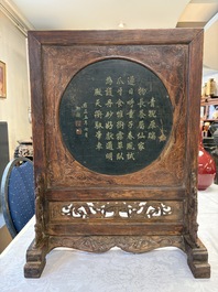 A Chinese huali and lacquer table screen embellished with stones and mother-of-pearl, Yongzheng mark, dated 1727, probably later.
