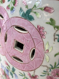 A Chinese famille rose garden seat with butterflies, flowers and fruiting branches, 19th C.