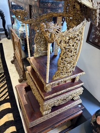An exceptional Vietnamese gilt-lacquered wood and ivory 'Dragon and Phoenix' throne-shaped altar, 18/19th C.
