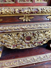 An exceptional Vietnamese gilt-lacquered wood and ivory 'Dragon and Phoenix' throne-shaped altar, 18/19th C.