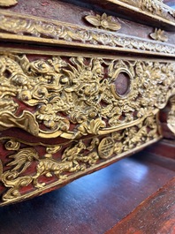 An exceptional Vietnamese gilt-lacquered wood and ivory 'Dragon and Phoenix' throne-shaped altar, 18/19th C.