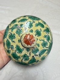 A rare pair of Chinese famille verte yellow-ground 'Flower Scroll' covered vases, Kangxi