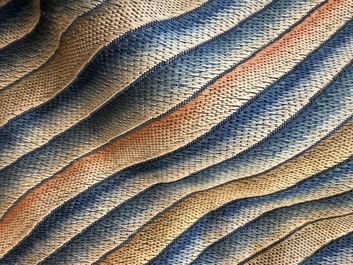A Chinese silk blue-ground summer gauze 'Dragons' robe, 19th C.