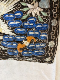 A pair of Chinese embroidered silk 'Civil Ninth-Rank' badges and a pair of kesi 'Civil Fifth-Rank' badges, Qing