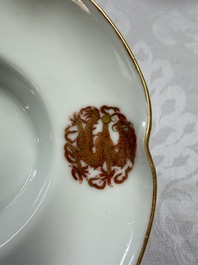 A fine Chinese iron-red gilt-decorated covered teabowl with a stand, Guangxu mark and of the period