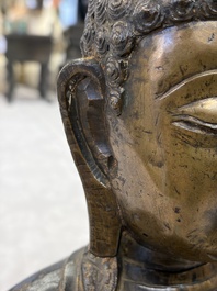 A Chinese bronze figure of Buddha, Ming