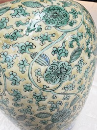 A rare pair of Chinese famille verte yellow-ground 'Flower Scroll' covered vases, Kangxi