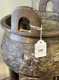 A rare Chinese gold- and silver-inlaid bronze 'Ding' censer with Taotie design on a hongmu stand, Shaosheng 紹聖 and Su Zhe 蘇轍 mark, Song or later