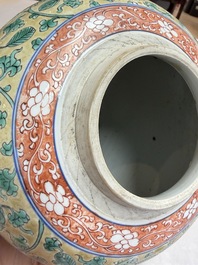 A rare pair of Chinese famille verte yellow-ground 'Flower Scroll' covered vases, Kangxi