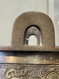 A rare Chinese gold- and silver-inlaid bronze 'Ding' censer with Taotie design on a hongmu stand, Shaosheng 紹聖 and Su Zhe 蘇轍 mark, Song or later