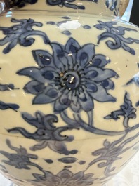 A Chinese blue and white 'Lotus Scroll' vase and cover, Ming