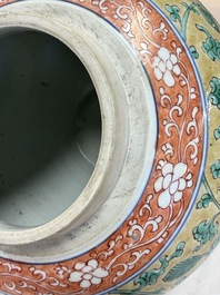 A rare pair of Chinese famille verte yellow-ground 'Flower Scroll' covered vases, Kangxi