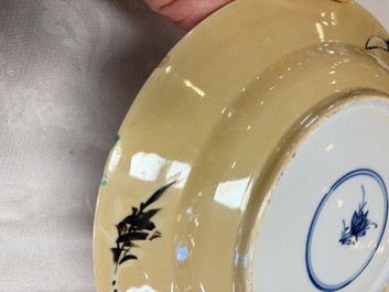A pair of Chinese famille verte caf&eacute;-au-lait-ground plates with floral design, lotus mark, Kangxi