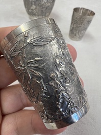 A Chinese Canton or Vietnamese silver bottle vase with landscape design and six cups, 19th C.