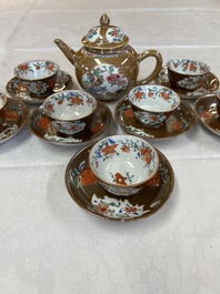 A Chinese famille rose capucine-ground covered teapot with floral design, seven cups and saucers, Yongzheng/Qianlong