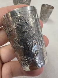 A Chinese Canton or Vietnamese silver bottle vase with landscape design and six cups, 19th C.
