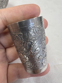A Chinese Canton or Vietnamese silver bottle vase with landscape design and six cups, 19th C.