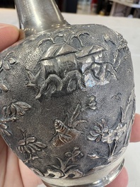 A Chinese Canton or Vietnamese silver bottle vase with landscape design and six cups, 19th C.