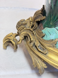 A massive pair of gilt-bronze-mounted famille noire style vases, Samson, Paris, 19th C.