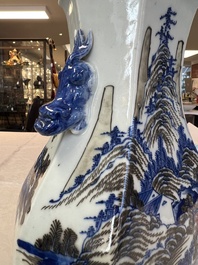 A Chinese blue, white and copper-red 'Hu' vase with figures in a mountainous landscape, 19th C.