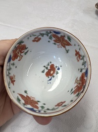 A Chinese famille rose capucine-ground covered teapot with floral design, seven cups and saucers, Yongzheng/Qianlong