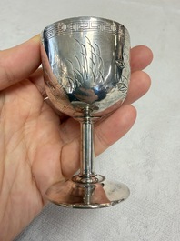 A Chinese silver 'Dragon' vase, two stem cups and a handled cup, various marks, 19/20th C.