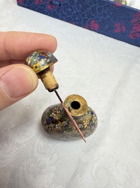 A collection of 12 Chinese cloisonn&eacute; snuff bottles with floral design, 19/20th C.