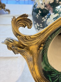 A massive pair of gilt-bronze-mounted famille noire style vases, Samson, Paris, 19th C.