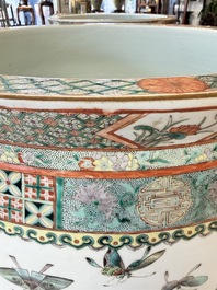 A pair of Chinese famille verte 'Flowers and Butterflies' fishbowls, 19th C.